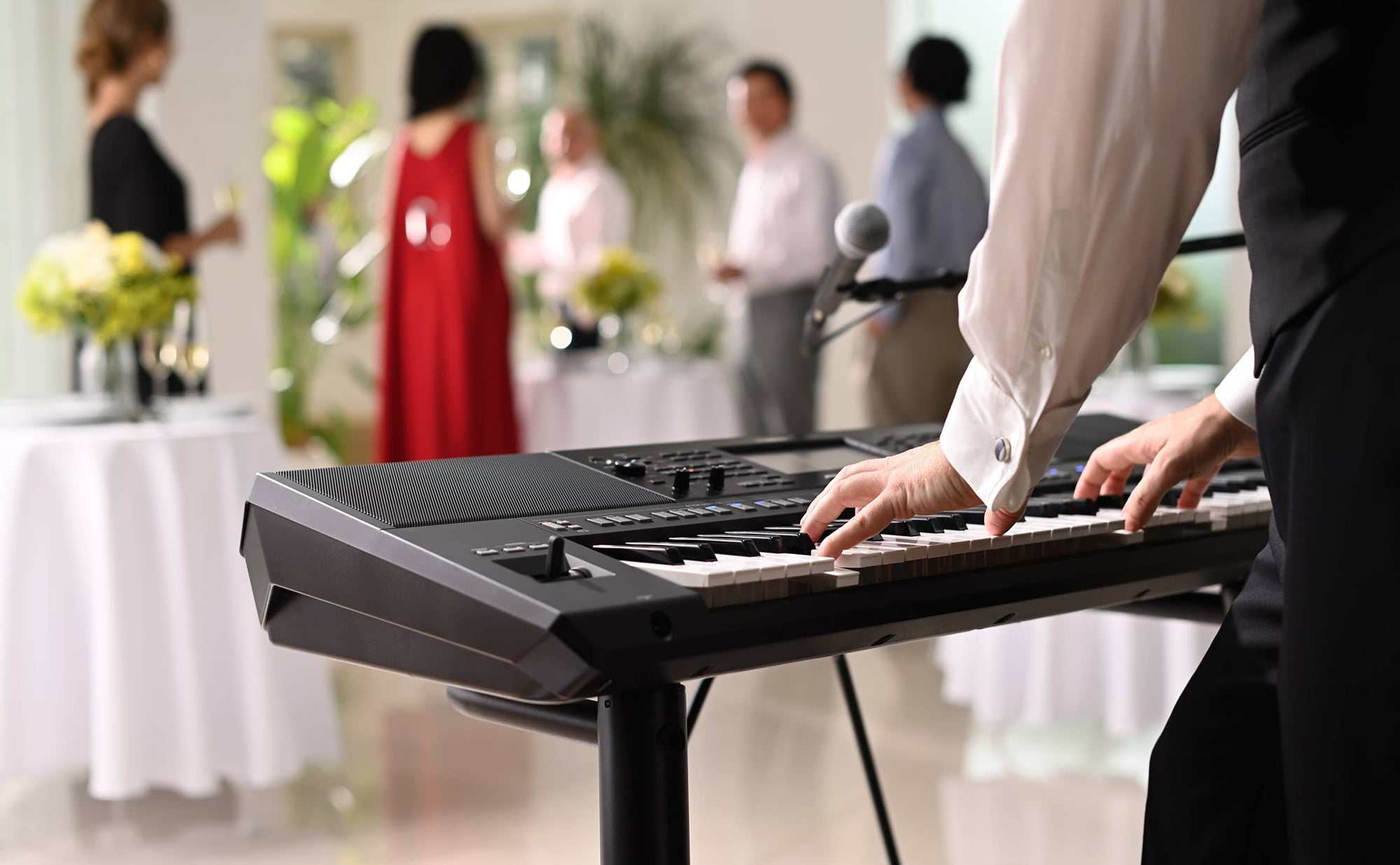 Yamaha Arranger Workstation PSR-SX920 being played at a party venue.