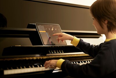 A tablet placed on the piano