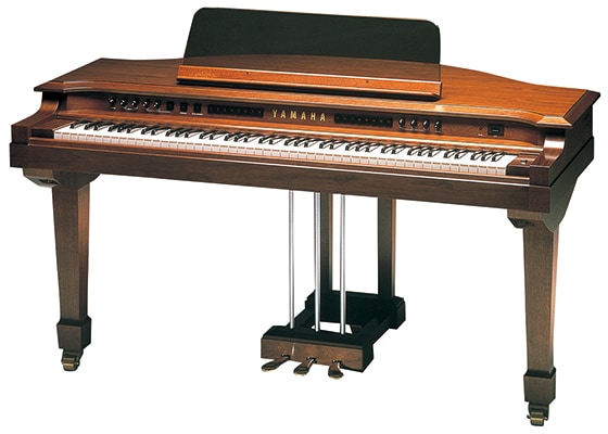 photo:Released in 1981, the GS1 digital keyboard featured FM tone generation and touch-sensitive control. Notable for its grand piano-like body, the GS1 was an expensive instrument that sold for 2.6 million yen.