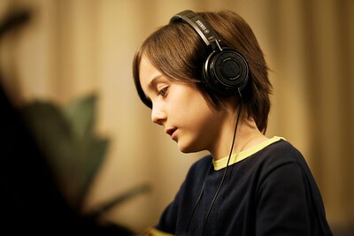 A boy wearing headphones